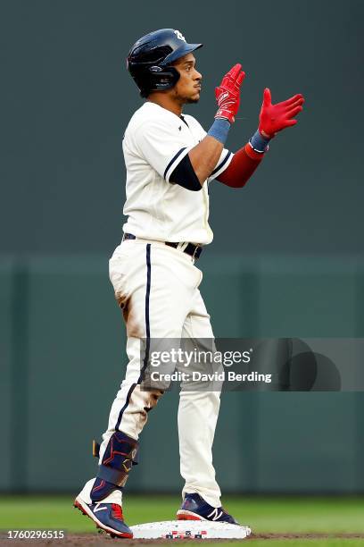 Jorge Polanco of the Minnesota Twins celebrates his double against the Cleveland Guardians in the second inning at Target Field on August 28, 2023 in...