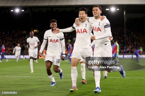 Son Heung-Min of Tottenham Hotspur celebrates with teammates Emerson and Brennan Johnson of Tottenham Hotspur after scoring the team's second goal...
