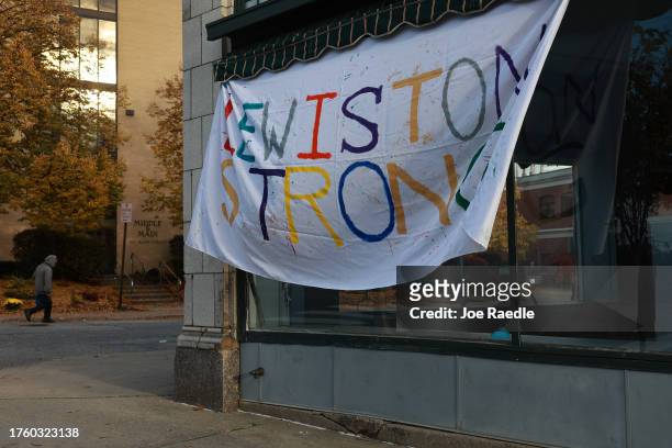 Lewiston Strong sign is seen after two mass shootings on October 27, 2023 in Lewiston, Maine. Police are actively searching for a suspect, Army...