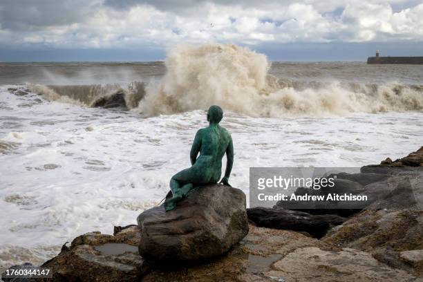 Waves crash over Cornelia Parker's Mermaid statue on Sunny Sands Beach, Folkestone on the 2nd of November 2023, as Storm Ciarán swept across the...