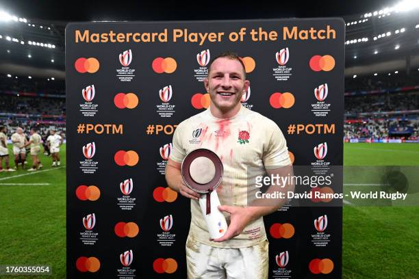 The MASTERCARD Player of the Match, Sam Underhill of England, is presented with a Trophy after the Rugby World Cup France 2023 Bronze Final match...