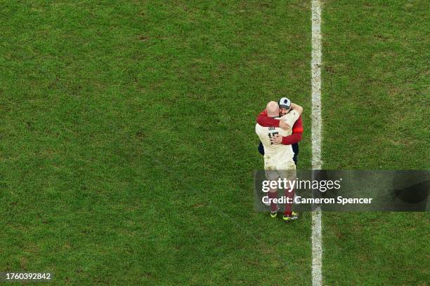 Dan Cole of England embraces teammate Joe Marler following the team's victory during the Rugby World Cup France 2023 Bronze Final match between...