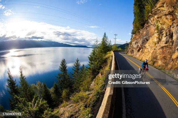 road bicycle touring - road cycling stock pictures, royalty-free photos & images