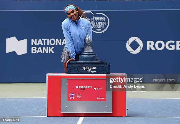 Serena Williams holds the winner's trophy after her 6-2, 6-0 win over Sorana Cirstea of Romania during the finals of Rogers Cup Toronto at Rexall...