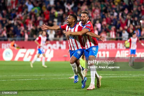 Yangel Herrera of Girona FC celebrates with his teammate Cristhian Stuani after scoring the team's first goal during the LaLiga EA Sports match...