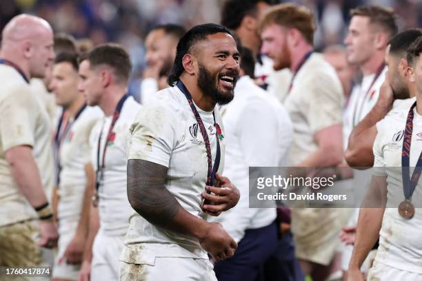 Manu Tuilagi of England celebrates with his bronze medal following the team's victory during the Rugby World Cup France 2023 Bronze Final match...