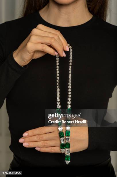 An exquisite emerald and diamond necklace, with a total weight of 59.41 is displayed during the Sotheby's Geneva Luxury Week press call on November...