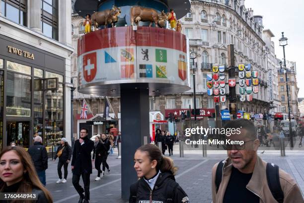 Swiss glockenspiel clock in Leicester Square on 16th October 2023 in London, United Kingdom. Leicester Square is a pedestrianised square in the West...