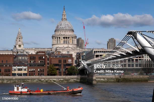 Millennium Bridge, which is currently closed to pedestrians due to planned maintainance, repairs and cleaning looking towards St Paul's Cathedral on...