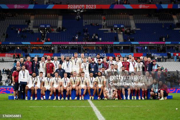 The players of England pose for a squad photo at full-time after receiving their bronze medals following victory in the Rugby World Cup France 2023...