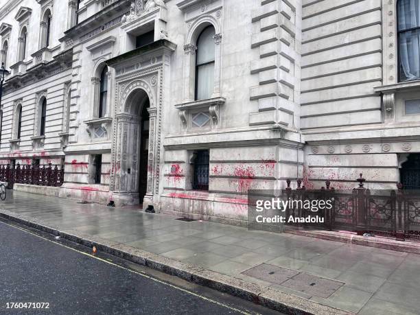The Foreign Office building in London was targeted Thursday by activists who wrote 'Britain is guilty' on it in blood-red paint on the 106th...
