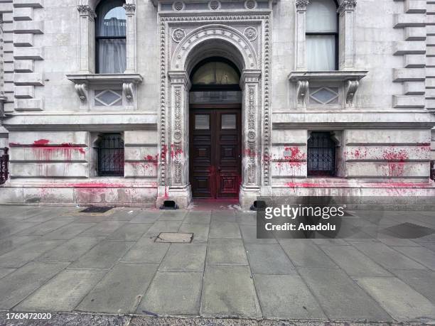 The Foreign Office building in London was targeted Thursday by activists who wrote 'Britain is guilty' on it in blood-red paint on the 106th...