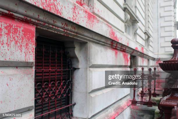 The Foreign Office building in London was targeted Thursday by activists who wrote 'Britain is guilty' on it in blood-red paint on the 106th...