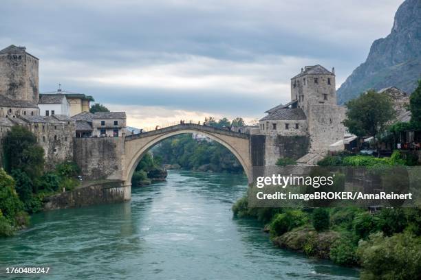 historic old town of mostar on the neretva river, stari most, old bridge, mostar, herzegovina, bosnia and herzegovina - mostar stock pictures, royalty-free photos & images