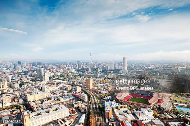 skyline of johannesburg with ellis park stadium, gauteng province, south africa - johannesburg stockfoto's en -beelden