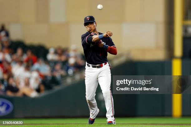 Jorge Polanco of the Minnesota Twins throws the ball to first base to get out Bo Naylor of the Cleveland Guardians in the sixth inning at Target...