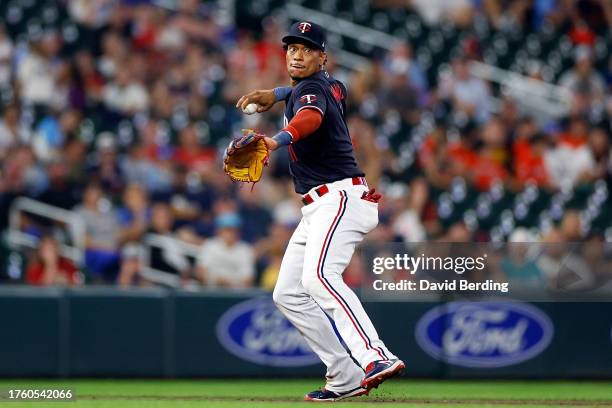 Jorge Polanco of the Minnesota Twins throws the ball to first base to get out Gabriel Arias of the Cleveland Guardians in the eighth inning at Target...