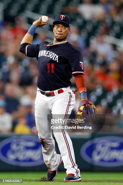 Jorge Polanco of the Minnesota Twins throws the ball to first base to get out Gabriel Arias of the Cleveland Guardians in the eighth inning at Target...