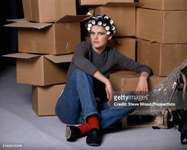 British model Stella Tennant with rollers in hair while backstage at a fashion show, circa 1995.