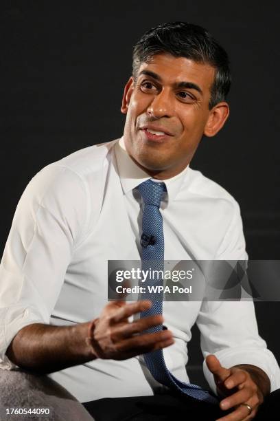 Britain's Prime Minister Rishi Sunak gestures during an in-conversation event with Tesla and SpaceX's CEO Elon Musk at Lancaster House on November 2,...
