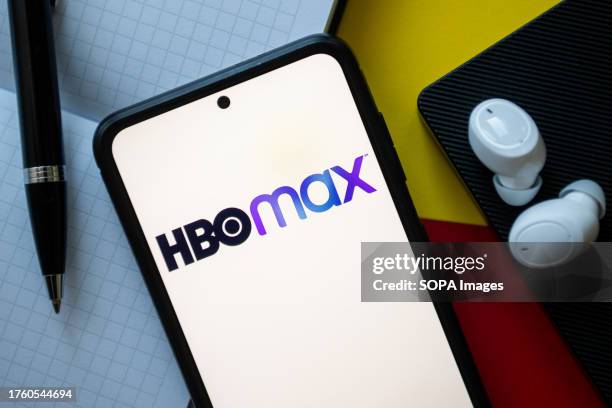 In this photo illustration a HBO Max logo seen displayed on a smartphone.