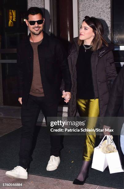 Taylor Lautner and Taylor Dome are seen on November 2, 2023 in New York City.