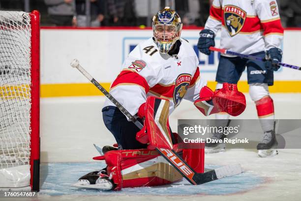 Anthony Stolarz of the Florida Panthers takes some shots in warm ups before the game against the Detroit Red Wings at Little Caesars Arena on...