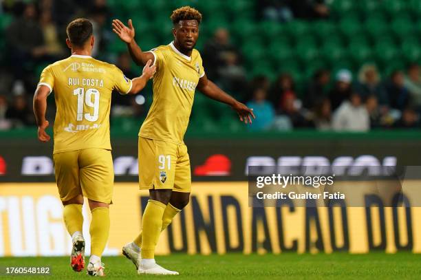 Ze Luis of SC Farense and Rui Costa of SC Farense celebrate after a goal during the Allianz Cup match between Sporting CP and SC Farense at Estadio...