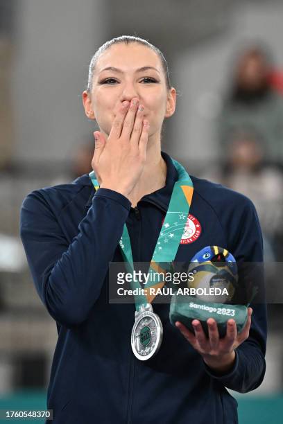 Evita Griskenas stands in the podium with her silver medal in the rhythmic gymnastics individual ribbon qualification of the Pan American Games...
