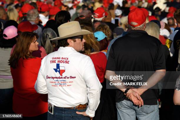 Supporters of former US President and 2024 Republican Presidential hopeful Donald Trump attend a campaign event at Trendsetter Engineering, Inc. In...