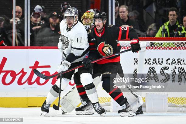 Anze Kopitar of the Los Angeles Kings and Travis Hamonic of the Ottawa Senators battle for position during the second period at Canadian Tire Centre...