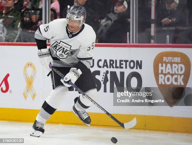 Quinton Byfield of the Los Angeles Kings controls the puck against the Ottawa Senators at Canadian Tire Centre on November 2, 2023 in Ottawa,...