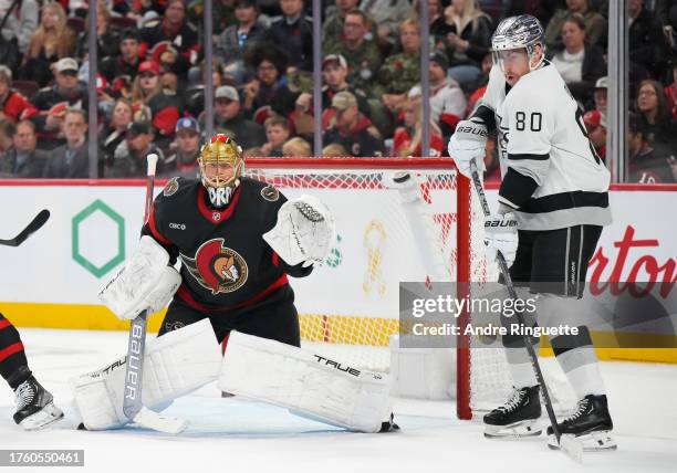 Pierre-Luc Dubois of the Los Angeles Kings tries to deflect the puck toward Joonas Korpisalo of the Ottawa Senators at Canadian Tire Centre on...