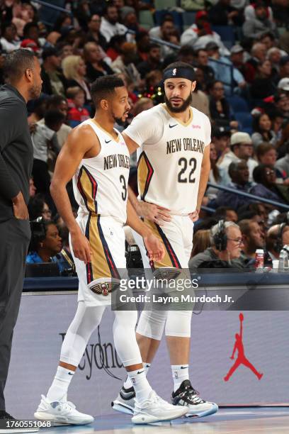 Larry Nance Jr. #22 and CJ McCollum of the New Orleans Pelicans on the court during the game against the Detroit Pistons on November 2, 2023 at the...