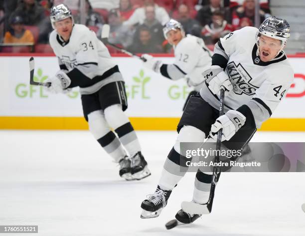 Mikey Anderson of the Los Angeles Kings passes the puck against the Ottawa Senators at Canadian Tire Centre on November 2, 2023 in Ottawa, Ontario,...