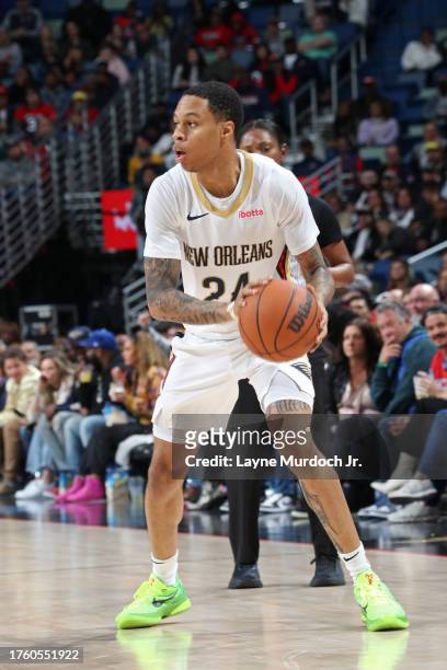 Jordan Hawkins of the New Orleans Pelicans looks to pass the ball during the game against the Detroit Pistons on November 2, 2023 at the Smoothie...