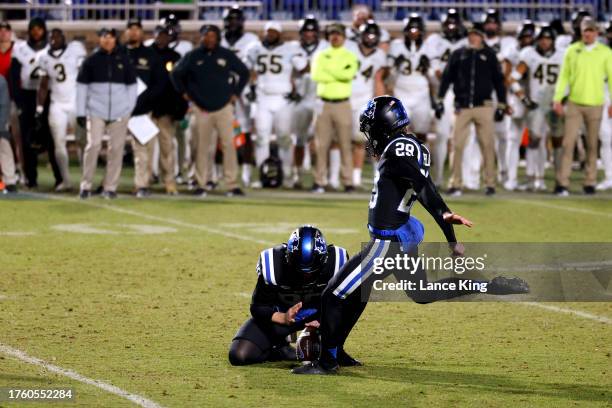 Todd Pelino of the Duke Blue Devils kicks the game-winning field goal as time expires in the game against the Wake Forest Demon Deacons at Wallace...