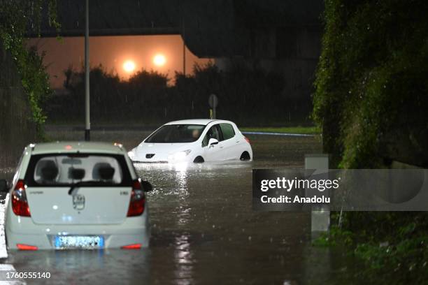 Cars are partially submerged after heavy rainfall causes flooding in Florence, Italy on November 02, 2023. Prato and Tuscany are among the affected...