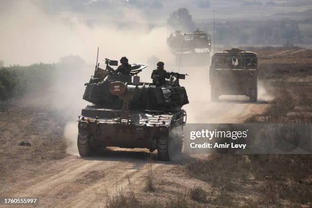 Israeli military vehicles travel near the border with the Gaza Strip on November 3, 2023 in Sderot, Israel. In the fourth week of Israel's response...