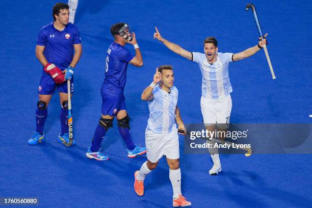 Tomas Domene and Matias Rey of Team Argentina celebrate during Field Hockey - Men's Team Preliminary Round Group A match between of Team Chile and of...