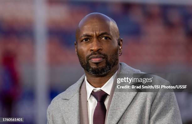 DaMarcus Beasley sits at the broadcast desk before a game between Colombia and USWNT at America First Field on October 26, 2023 in Sandy, Utah.