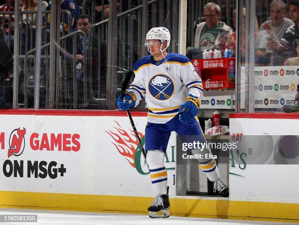 Connor Clifton of the Buffalo Sabres heads off the ice after he is given a game misconduct for a hit on Nico Hischier of the New Jersey Devils during...