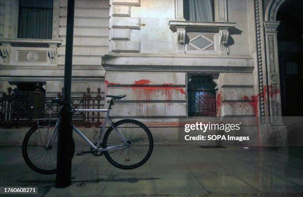 Trail of red paint follows the line of the building after it was attacked by Palestine Action. Activists from Palestine Action spray the Foreign...