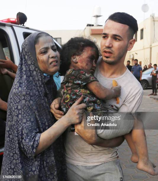 An injured child is brought to the Al Aqsa Hospital after the Israeli attack on Maghazi Refugee Camp in Deir Al-Balah, Gaza on November 03, 2023.