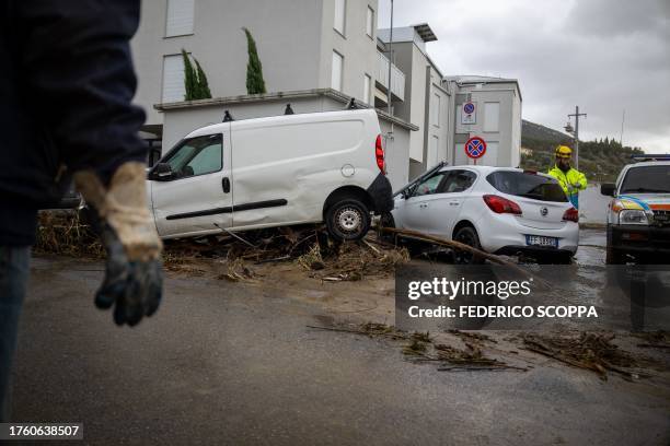 Men work in a flooded area of Montemurlo, near Prato, after heavy rain last night, on November 3, 2023. Storm Ciaran hit Tuscany late on November 2,...