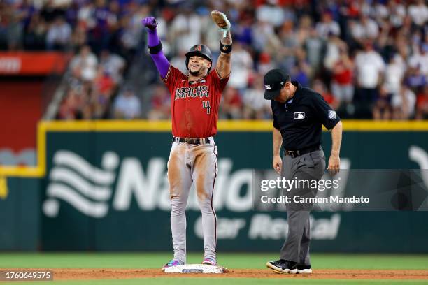 Ketel Marte of the Arizona Diamondbacks celebrates after stealing second base in the third inning against the Texas Rangers during Game One of the...