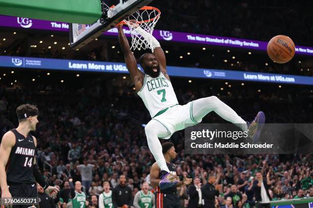 Jaylen Brown of the Boston Celtics yells after a dunk during the second quarter against the Miami Heat at TD Garden on October 27, 2023 in Boston,...