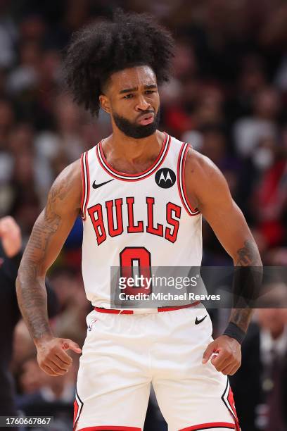 Coby White of the Chicago Bulls reacts against the Toronto Raptors during the first half at the United Center on October 27, 2023 in Chicago,...