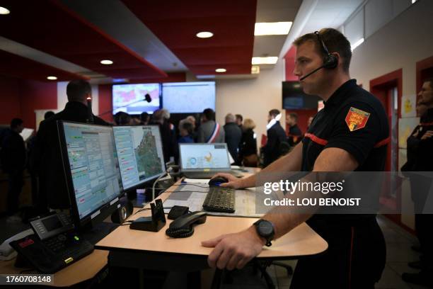 Fireman works at the call center of a fire station in Caen, northwestern France, on November 3, 2023.