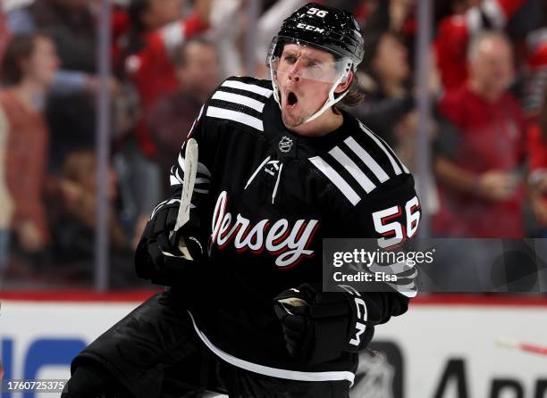 Erik Haula of the New Jersey Devils celebrates his game winning goal during the third period against the Buffalo Sabres at Prudential Center on...